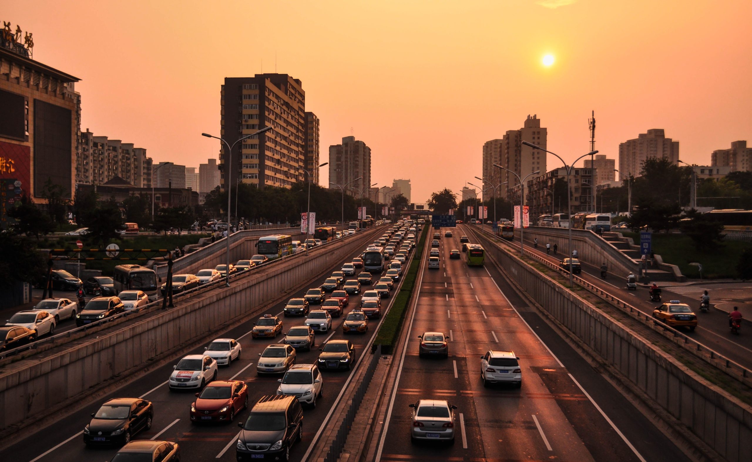 cars on the interstate at sunset