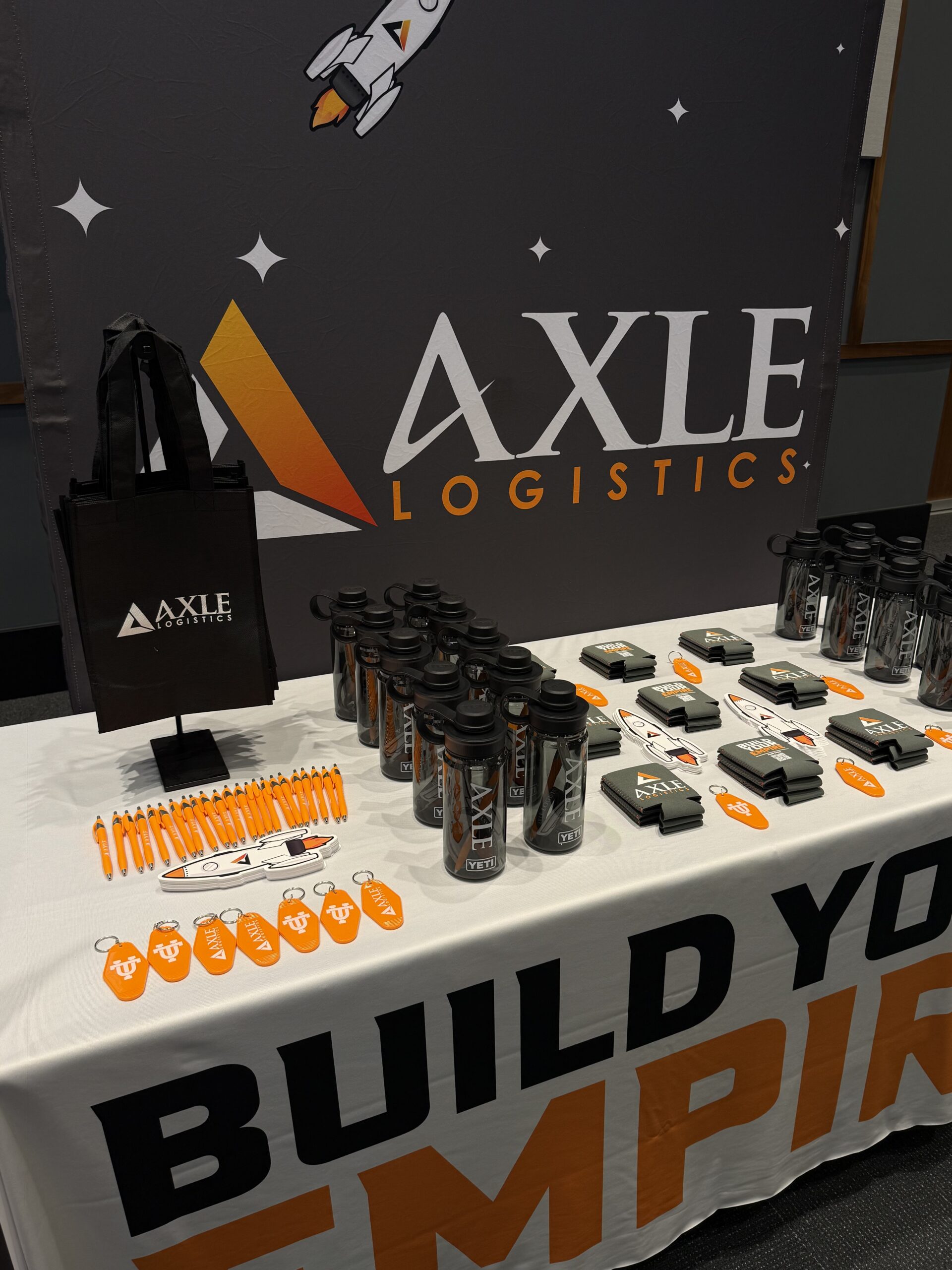 Axle Logistics Recruiting Team has a table at a UTK career fair.